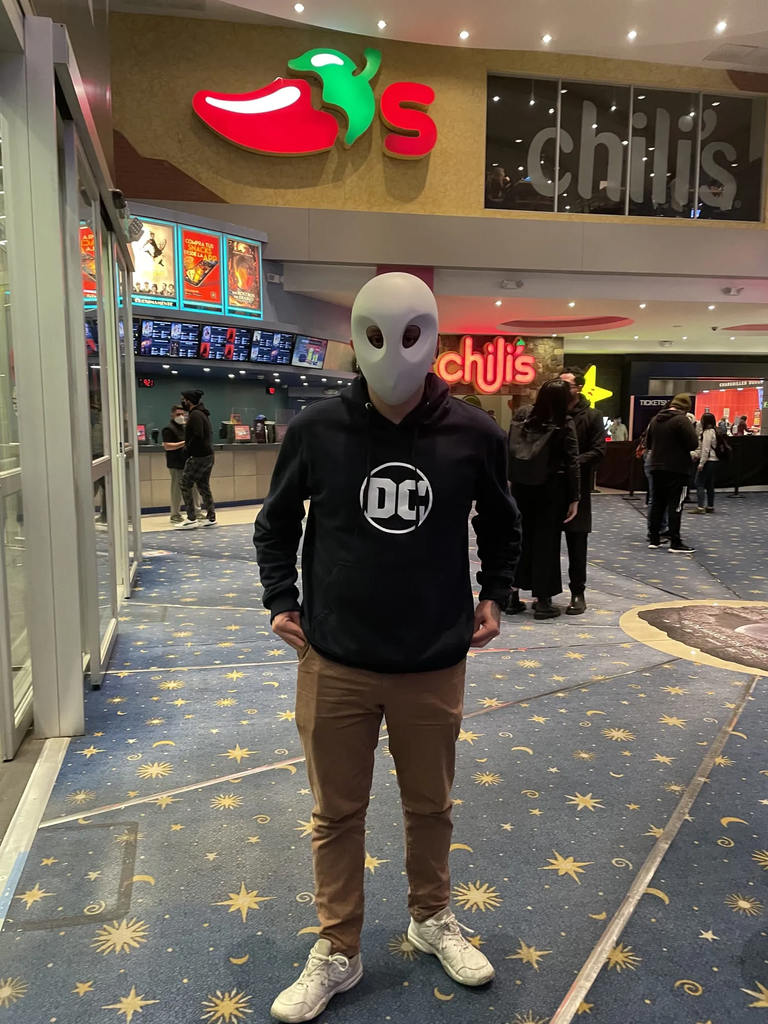Edu Wayne wearing a comic-inspired mask